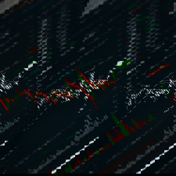 a display showing stock prices with peaks and troughs